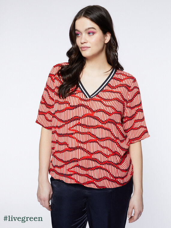 Blusa boxy stampata con bordo a righe