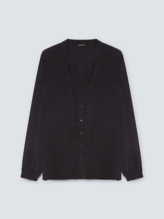 Blusa con pieghe davanti