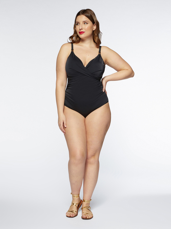 Black one-piece swimsuit with metal loops